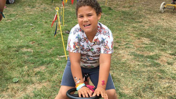 Kate's son Vincent, who has autism, needed a safe space to play at home. After applying for a Disabled Facilities Grant and being awarded a CWC grant, Kate can make her garden safe for Vincent to enjoy water games and trampolining.